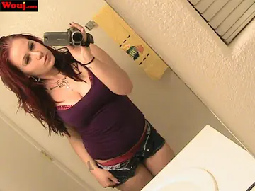 Redhead with Big Tits Poses in Lingerie for Mirror Selfies