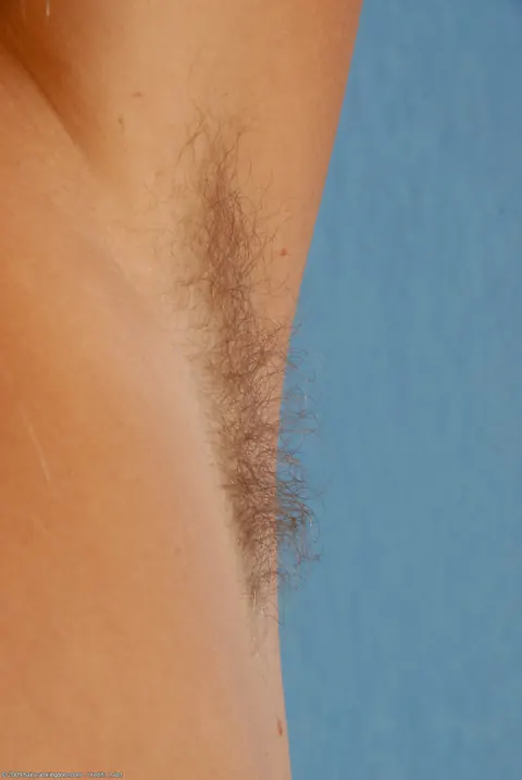 Blonde Pulls Her Panties Aside and Spreads Her Hairy Pussy – photo 7 of 21