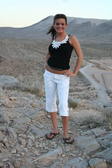 Busty Brunette Strips Out of Her Jeans and Spreads Outdoors