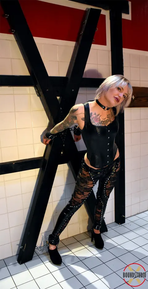 Tattooed Short-Haired Blonde Bound and Ball-Gagged in Leather – photo 1 of 16