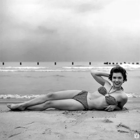 Barbara Cameron: Curly Blonde in a Bikini and Glasses Poses Outdoors – photo 6 of 12