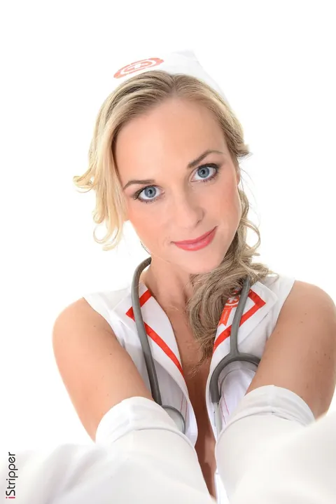 Vinna Reed: Thick European Blonde Nurse Strips Out of Her Uniform – photo 3 of 15