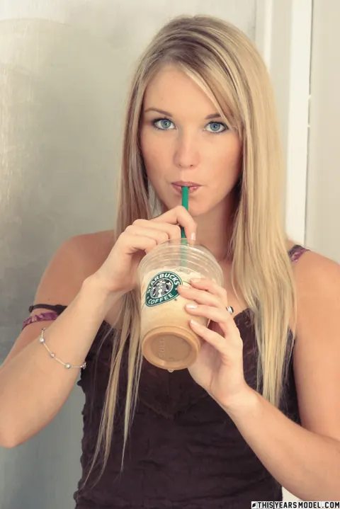 Blonde with a Piercing Undresses and Poses in Her Underwear – photo 1 of 10
