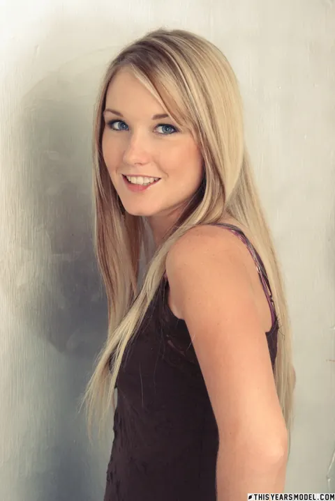 Blonde with a Piercing Undresses and Poses in Her Underwear – photo 2 of 10