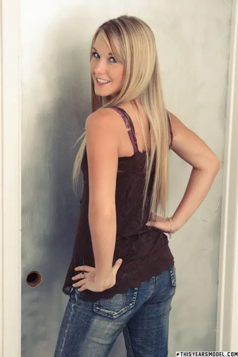 Blonde with a Piercing Undresses and Poses in Her Underwear – photo 3 of 10