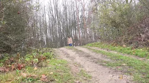 Brunette Unbuttons Her Jeans and Pees on a Country Lane – photo 1 of 15