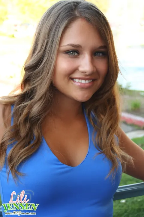Lili Jensen: Brunette Lifts Her Skirt to Show a Thong Outdoors – photo 1 of 12