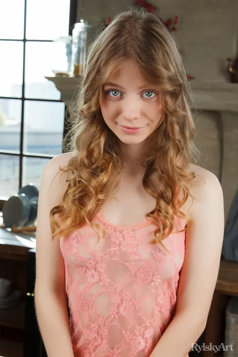 Woman Strips Nude on the Kitchen Table Beside Coffee – photo 12 of 16