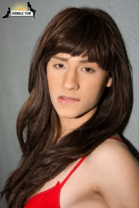 Trans Woman Strips Nude and Poses Front and Back Displaying Cock – photo 2 of 16