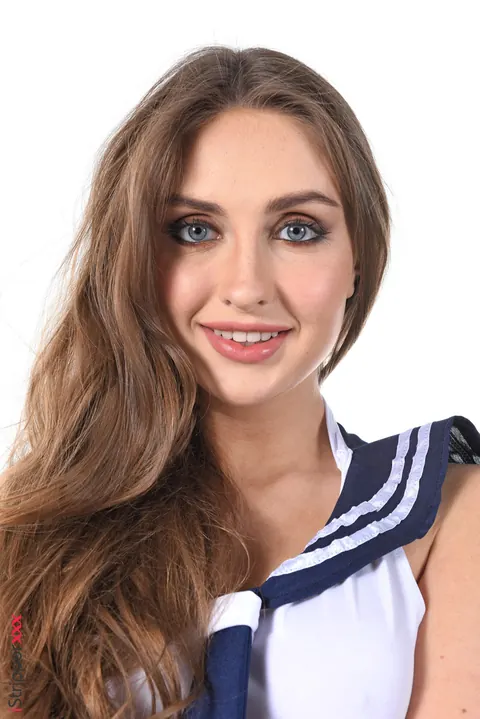 Lena Reif: Busty Brunette Strips Out of Her Uniform in Heels – photo 5 of 15