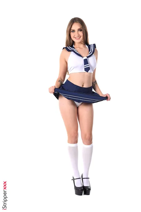 Lena Reif: Busty Brunette Strips Out of Her Uniform in Heels – photo 1 of 15