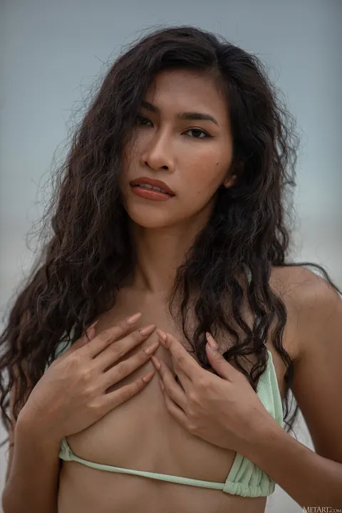 Slim Asian Brunette Poses in a Bikini on the Beach and Strips Nude – photo 2 of 21
