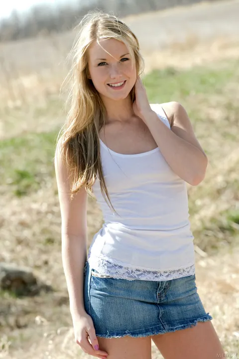 Blonde with Small Tits Undresses and Spreads Outdoors – photo 2 of 21