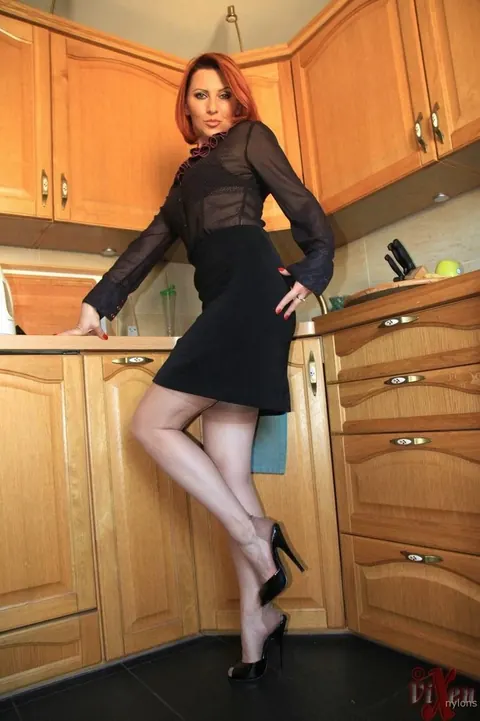 Vixen Nylons: Thick Redhead MILF Strips Out of Her Lingerie and Skirt in the Kitchen – photo 2 of 14