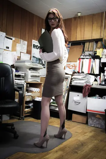 Redhead in Glasses Spreads Her Hairy Pussy in the Office