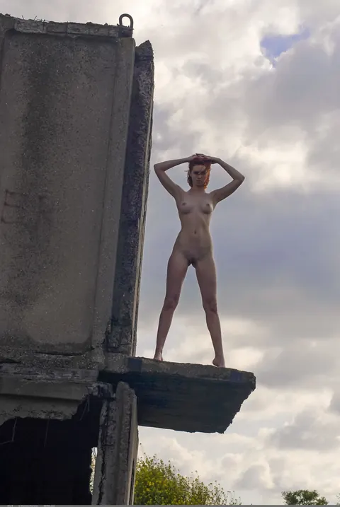 Redhead Poses Nude and Spreads Outdoors by an Abandoned Building – photo 16 of 17