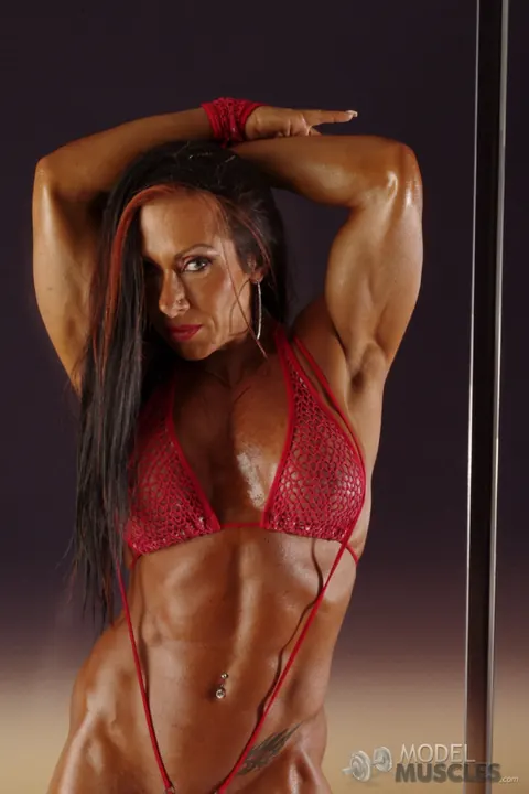 Monica Martin: Tanned Latina MILF Oils Her Muscular Body in a Bikini – photo 14 of 20