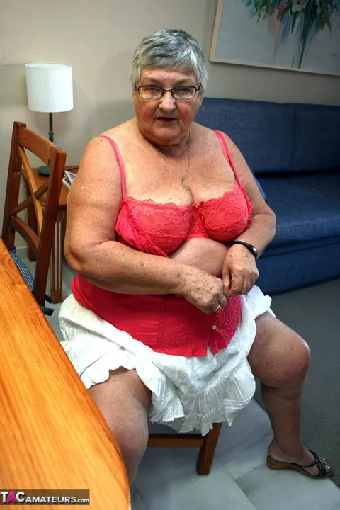 Busty British Brunette Bends Over in a Skirt to Show Her Curvy Figure – photo 5 of 20