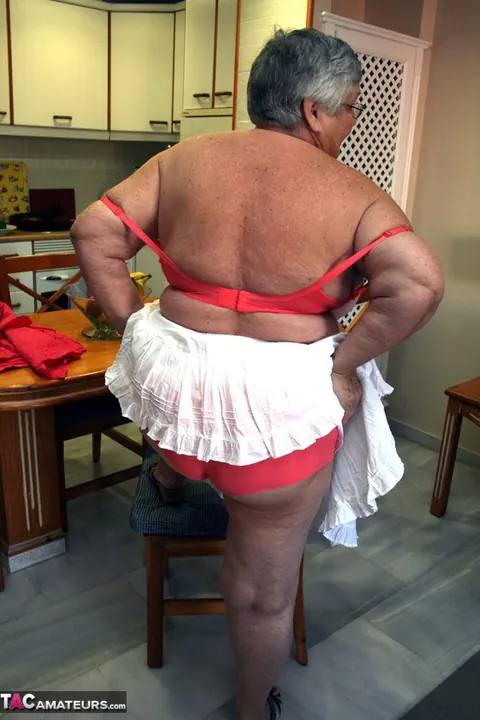 Busty British Brunette Bends Over in a Skirt to Show Her Curvy Figure – photo 8 of 20
