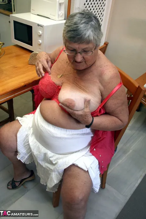 Busty British Brunette Bends Over in a Skirt to Show Her Curvy Figure – photo 6 of 20