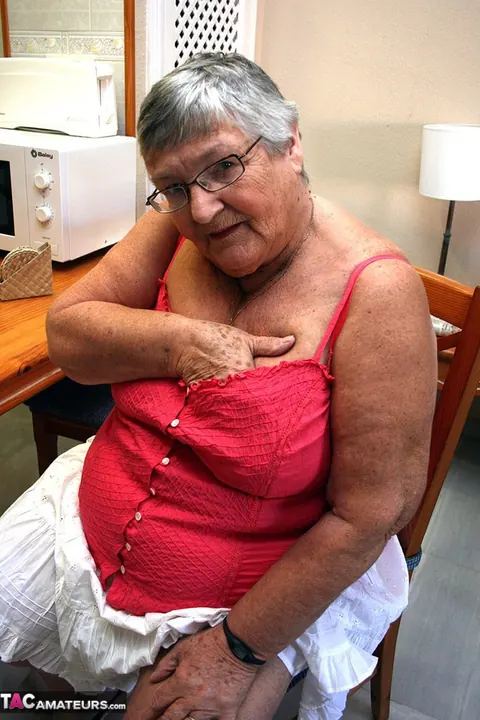 Busty British Brunette Bends Over in a Skirt to Show Her Curvy Figure – photo 3 of 20