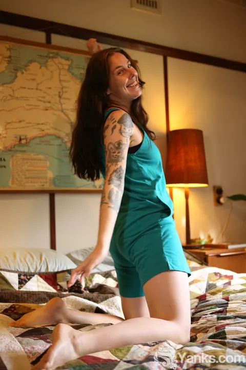 Tattooed MILF Frees Her Hairy Bush from Panties on the Bed – photo 2 of 15