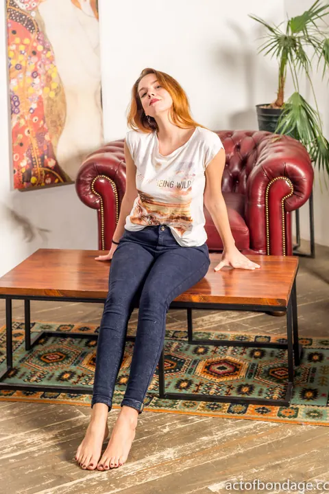 Redhead in Jeans and Socks Spreads Her Legs – photo 5 of 12