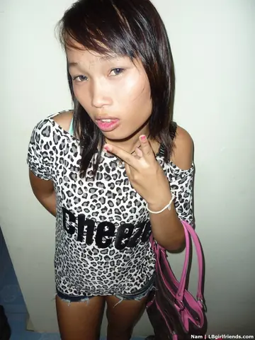 Petite Asian Trans Woman Strips Nude and Masturbates
