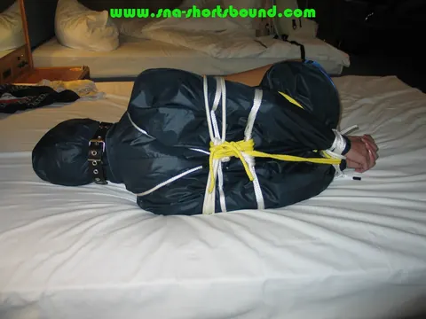 Woman Gagged and Bound in Shorts and Stockings – photo 8 of 16