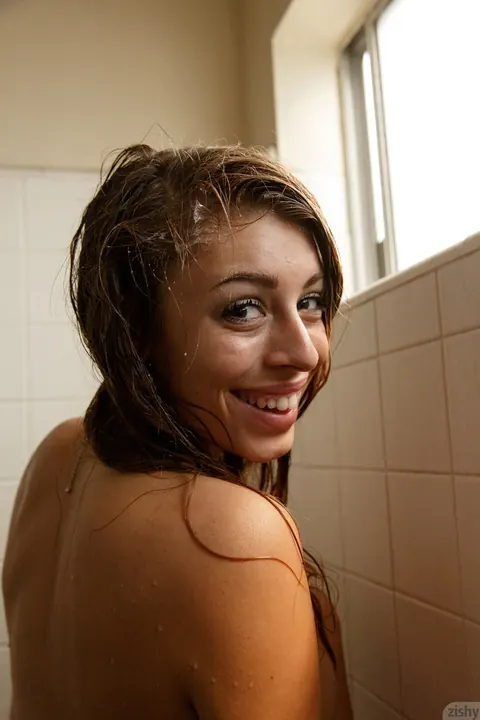 Gracie Thibble: Brunette with Big Natural Tits Massages Them in the Bathroom – photo 5 of 11