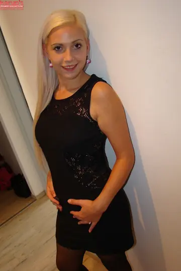 Blonde in Stockings and Heels Parts Her Legs Wide