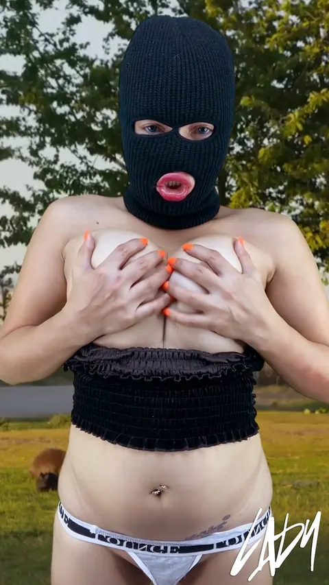 Busty Trans Woman Stands Nude Outdoors and Strokes Her Cock – photo 15 of 15