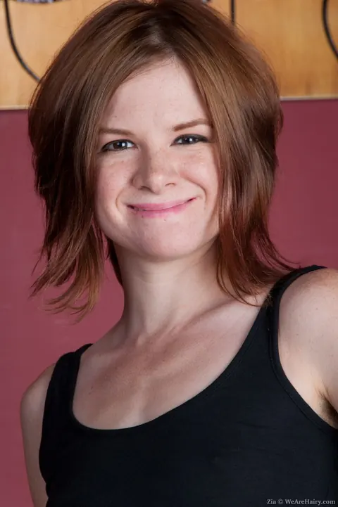 Petite Redhead Drops Her Jeans and Spreads Her Hairy Pussy – photo 1 of 18