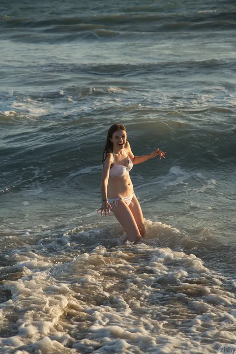 Penny Stiles: Petite Redhead in a Bikini and Glasses Spreads on the Beach – photo 9 of 11
