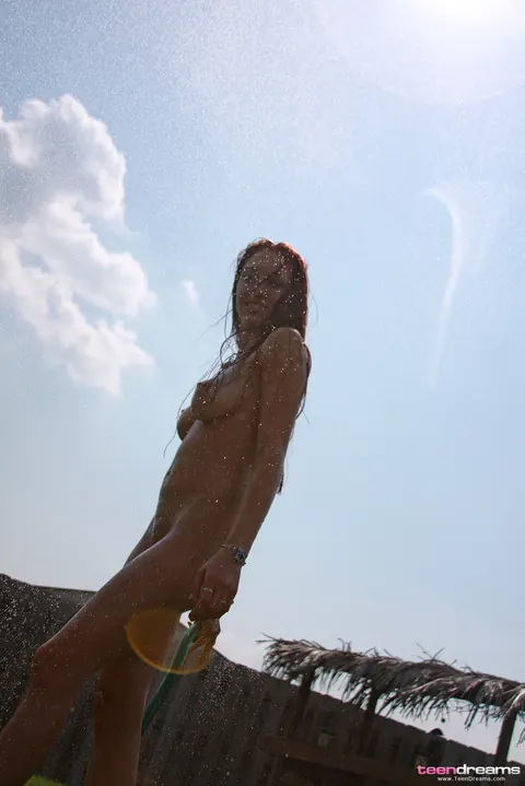 Victoria Nelson: Woman Strips Nude and Poses with a Hose – photo 11 of 21