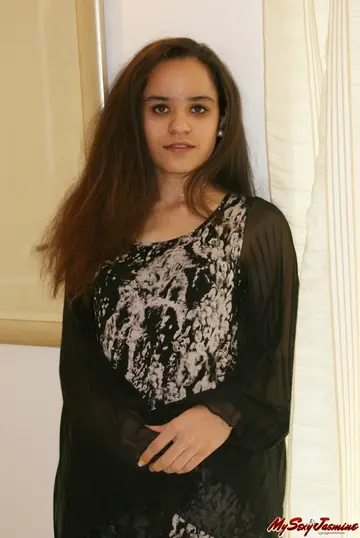 Indian Brunette Pulls Her Top Down and Strips to Her Panties