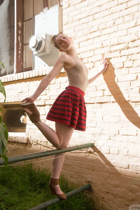 Julie Wheeler: Redhead Strips Out of Her Bodysuit and Skirt Outdoors and Spreads – photo 3 of 11