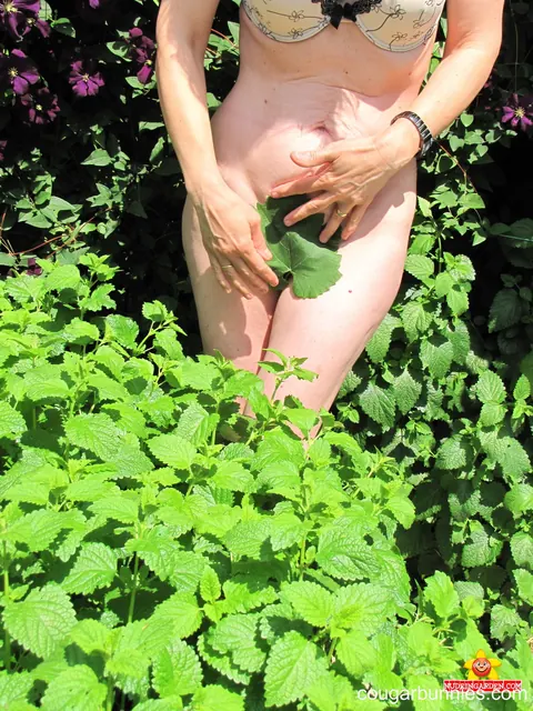 Doris Dawn: Thick Redhead MILF Strips Out of Her Lingerie in the Garden – photo 9 of 15