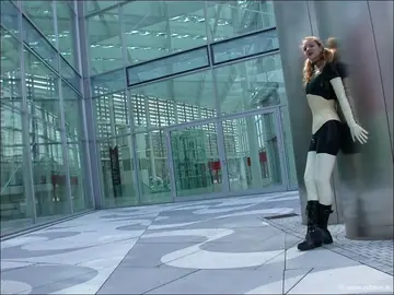 Blonde PAWG in Latex and Boots Poses Outdoors