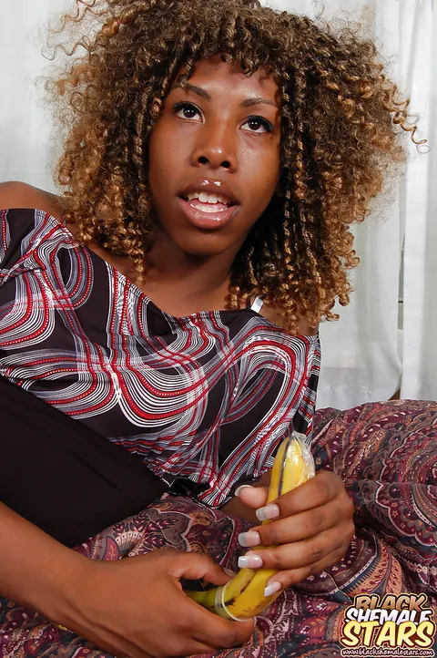 Ebony Trans Woman Uses a Banana Dildo and Masturbates – photo 10 of 16