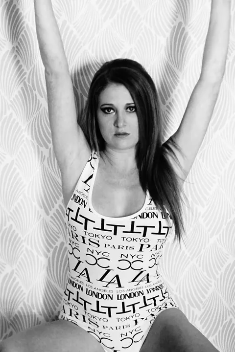 Woman Sheds Her Clothing and Poses Fully Nude – photo 15 of 21
