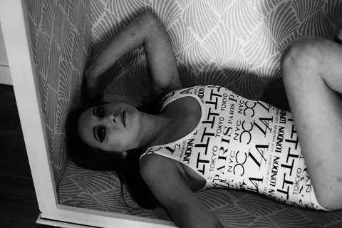 Woman Sheds Her Clothing and Poses Fully Nude – photo 8 of 21