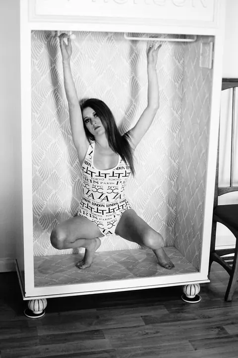 Woman Sheds Her Clothing and Poses Fully Nude – photo 13 of 21