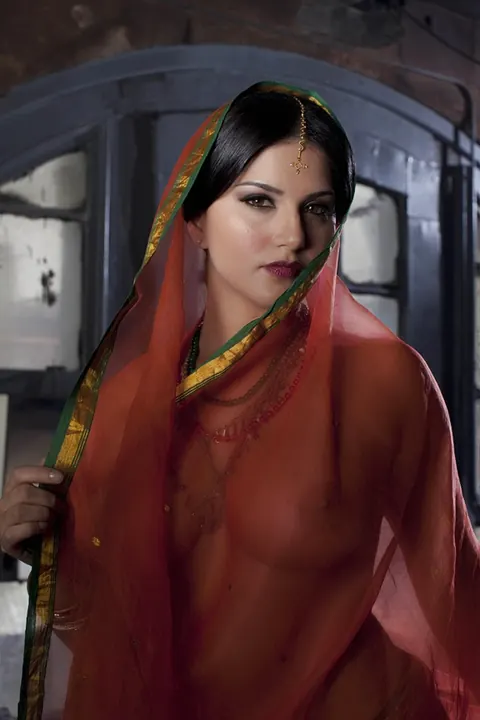 Sunny Leone: Indian MILF in a Sheer Dress Flaunts Her Big Tits – photo 7 of 20
