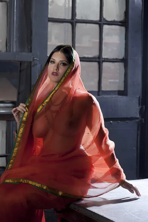 Sunny Leone: Indian MILF in a Sheer Dress Flaunts Her Big Tits – photo 20 of 20