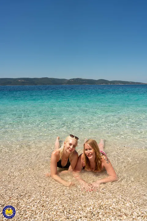 Mackenzie Page: Two Busty Blonde MILFs Strip Nude on the Beach – photo 12 of 20