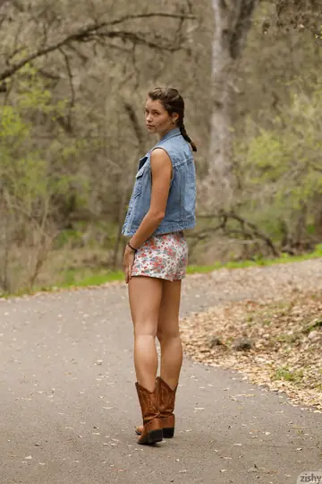 Brunette Teases in Her Denim Jacket and Jeans