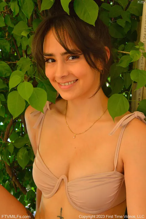 Brunette Undresses and Plays with a Toy Outdoors – photo 6 of 21