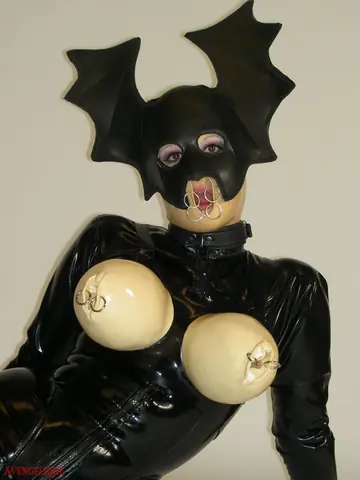 Busty Woman in Latex and High Heels Spreads and Uses a Toy