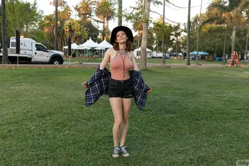 Redhead with Big Natural Tits Strips Off Her Shorts Outdoors